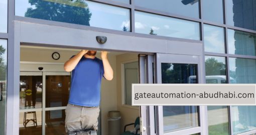 A technician is repairing of automatic Sliding Door in abu dhabi