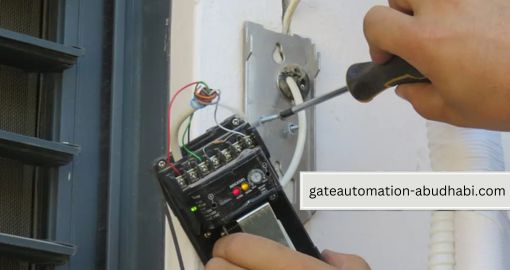 A technician with machine checking automatic system of gate with auto machines