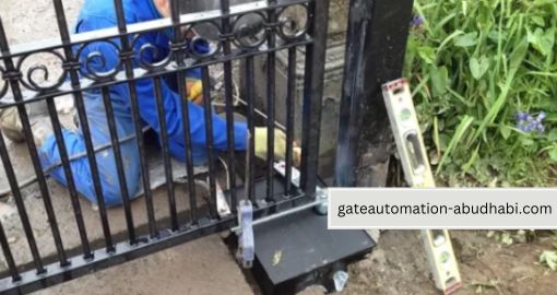 A technician is installing automatic gate