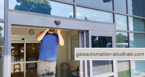 Automatic Sliding Door Repair in Abu Dhabi 3 A technician is repairing of automatic Sliding Door in abu dhabi