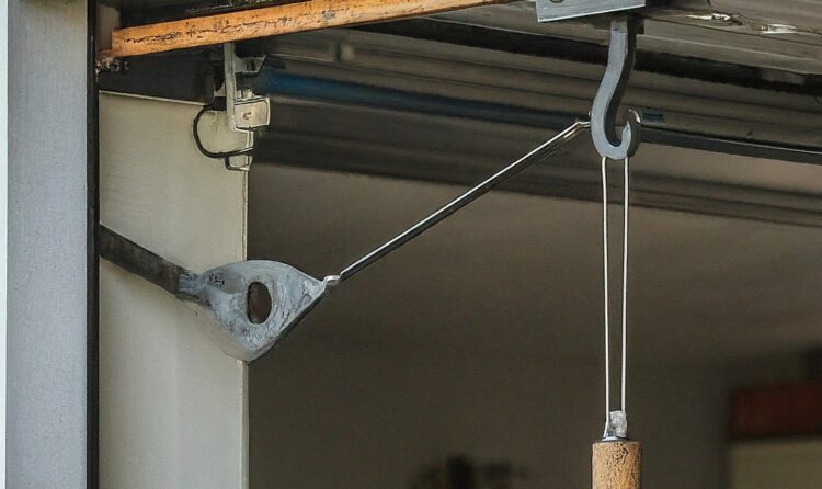 Expert Garage Door Panel and Spring Repair Guide 2 Expert Garage Door Panel and Spring Repair Guide in Abu Dhabi